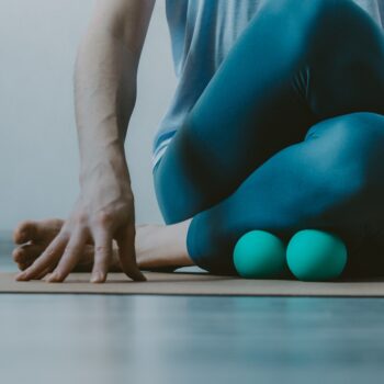 Person,Doing,Yin,Yoga,And,Myofascial,Release,On,Shin,Muscle.